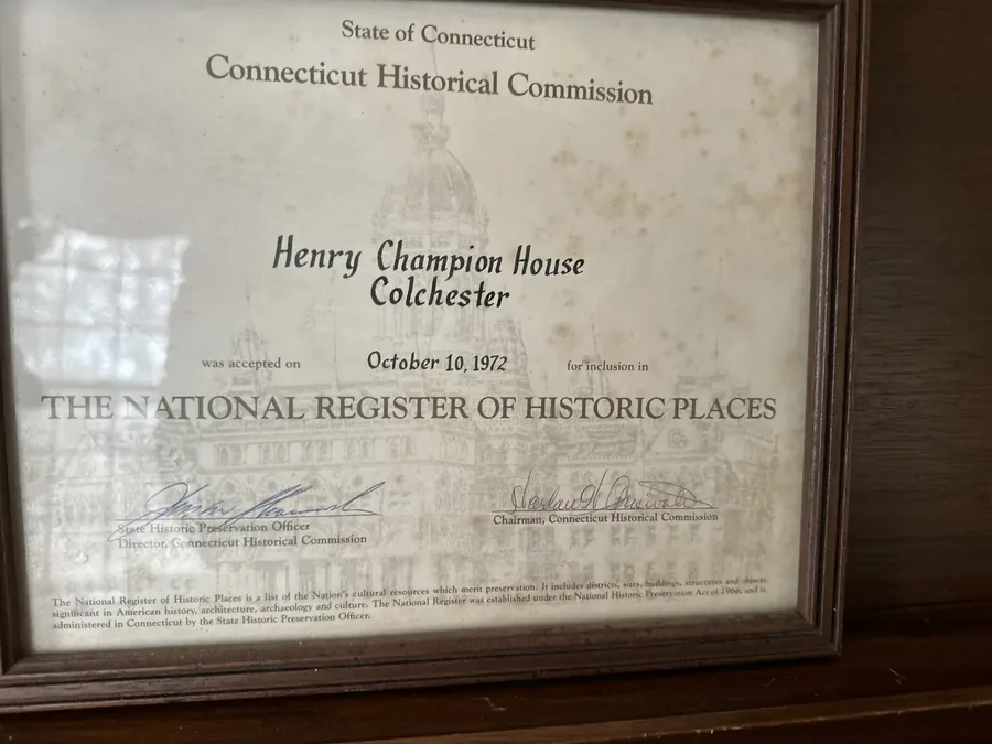 The framed Connecticut Historical Commission certificate admitting the house to the National Register in 1972