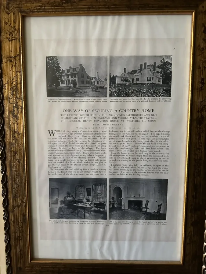 A framed early magazine article on the house at Westchester Centre, with archival photographs of its original rooms
